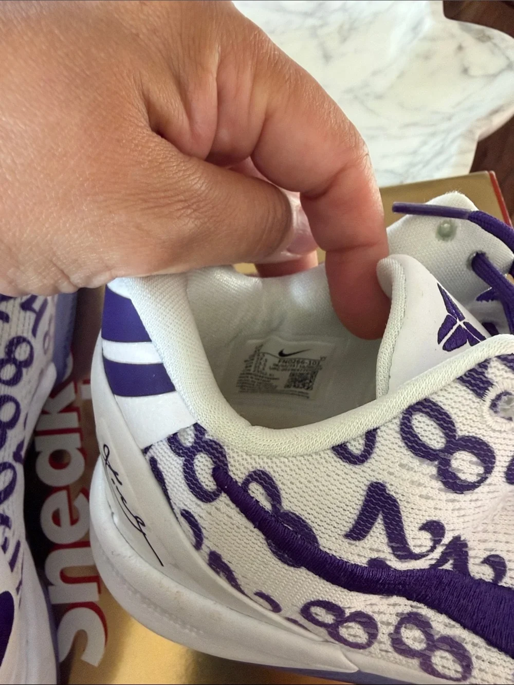 Nike Kobe kids sneakers with 8 and 24 numbers all over